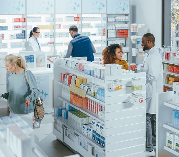 Pharmacist talking to customer